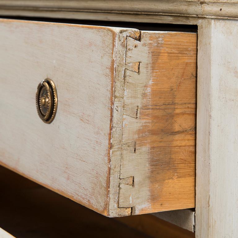 A 19th-century  chest of drawers.