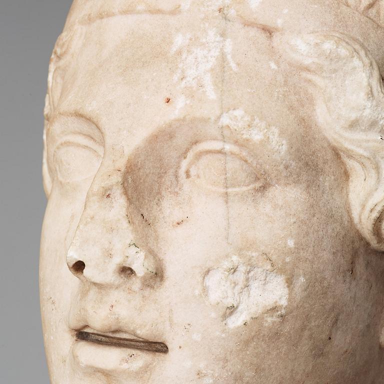 A marble portrait head of an athlet, Roman 150 AD or later ie until modern times.