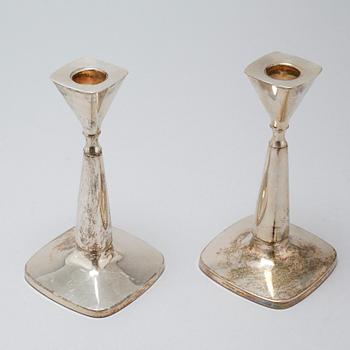 A pair of candlesticks by Thore Eldh for K&EC in Göteborg, 1960s.