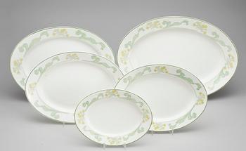 A Gunnar Wennerberg 82 pcs 'Gullviva' bone china dinner service, Gustafsberg 1905-20.