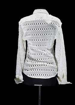 A white cottonlace shirt by Anna Sui.