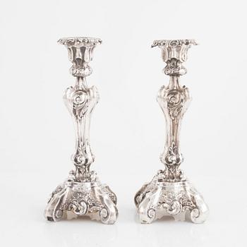 A Pair of Swedish Rococo-Revival Silver Candlesticks, Gustaf Möllenborg, Stockholm 1843-46.