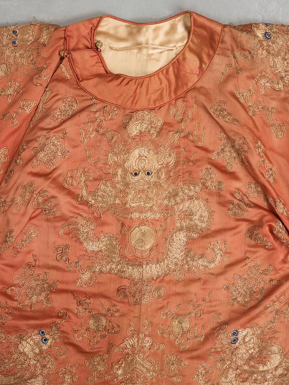 A ROBE, embroidered silk, height 131 cm, China late Qing dynasty (1644-1912).