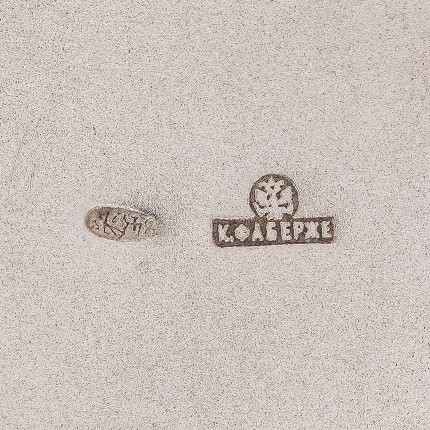 K. Fabergé, a silver sugar bowl and cream jug, Imperial Warrant mark, Moscow ca. 1913.