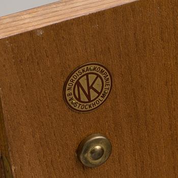 A "MODEL OK" SIDEBOARD DESIGNED BY AXEL EINAR HJORTH FOR NORDISKA KOMPANIET.