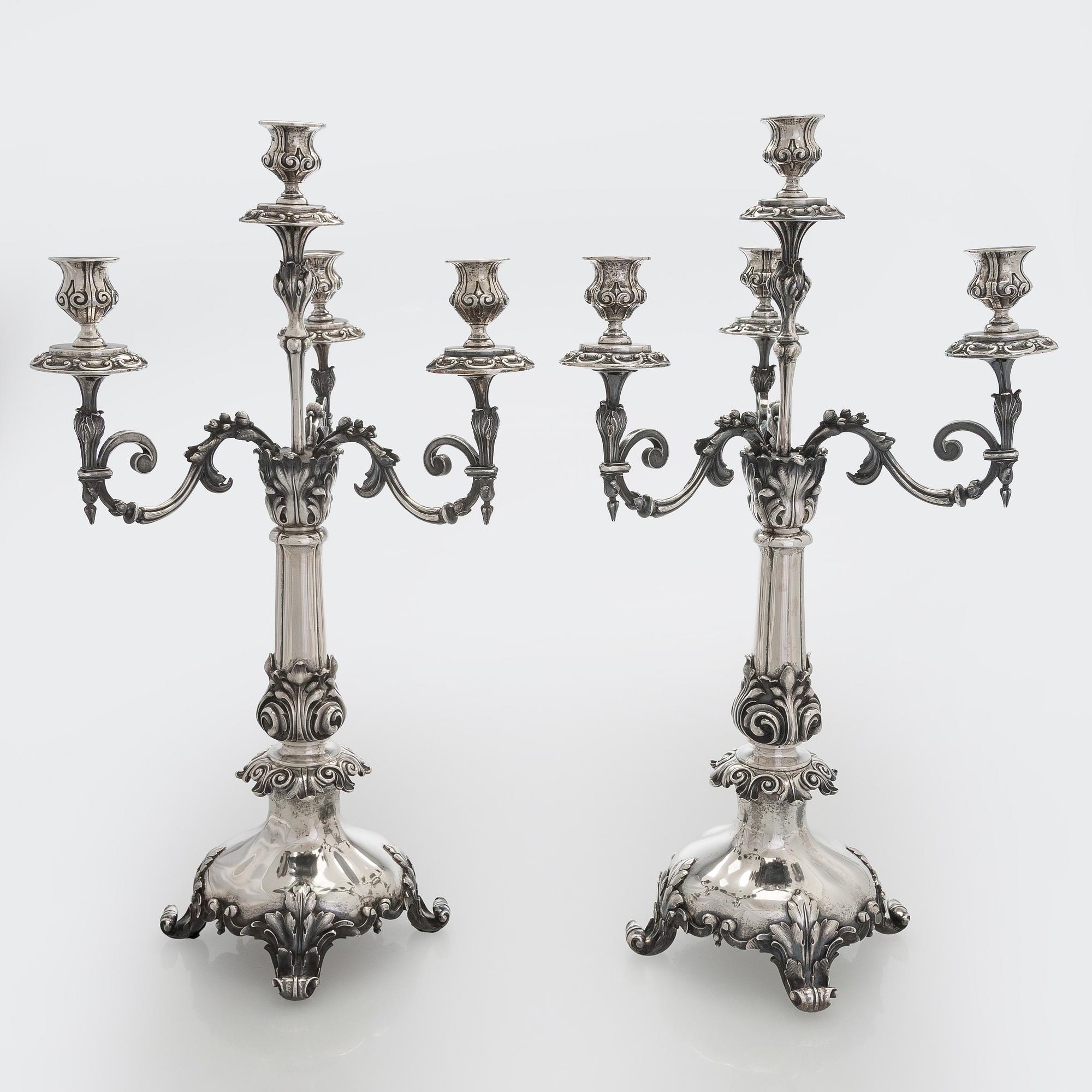 A pair of silver candelabra, maker marks of Carl Johan Tegelsten, Saint Petersburg 1850.