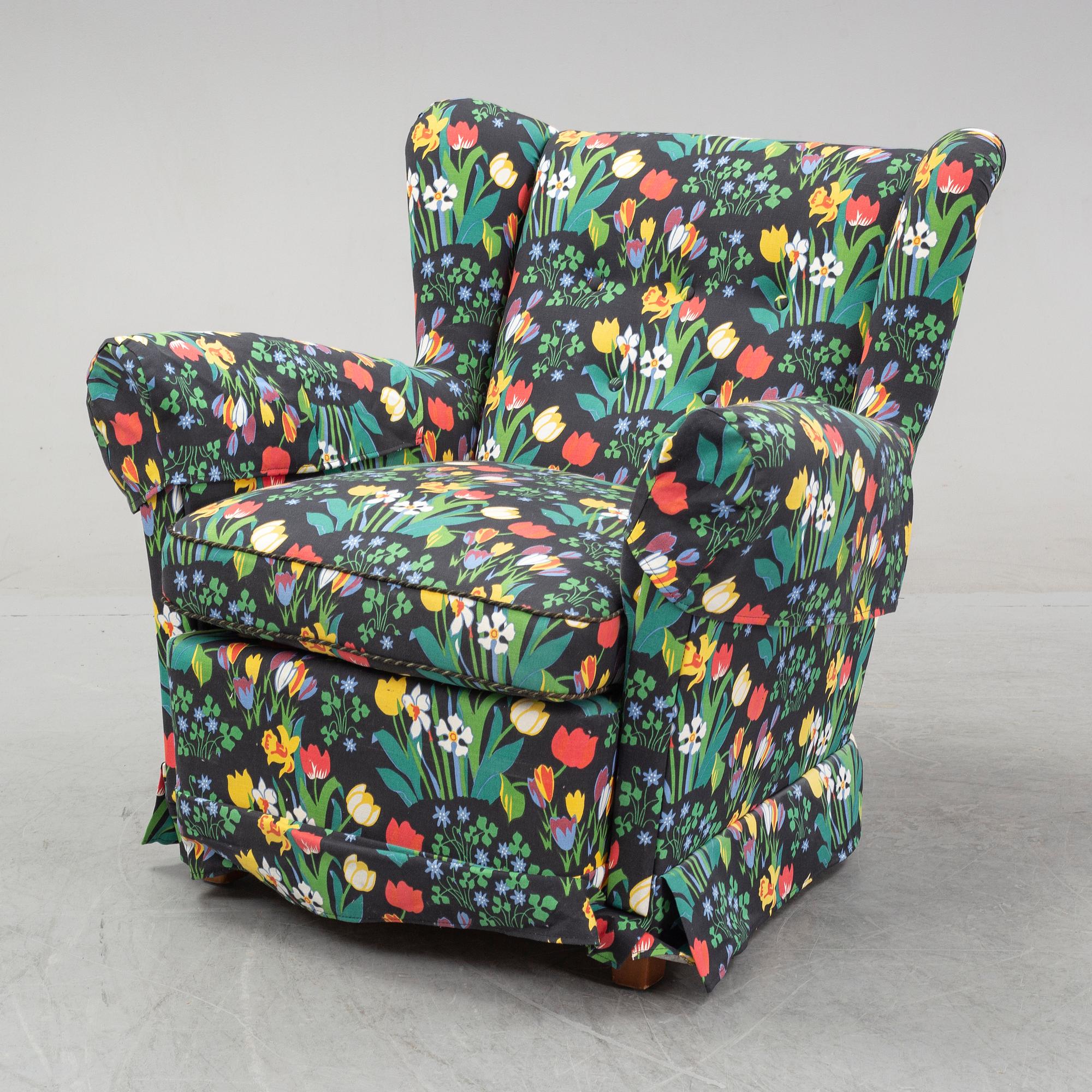 A sofa and wingback chair, later part of the 20th Century.