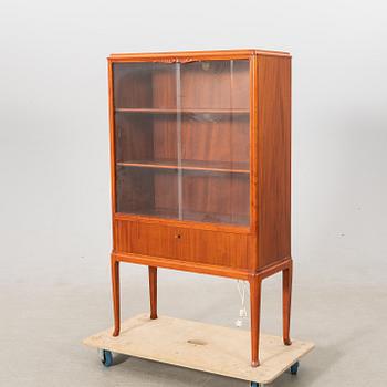 Display cabinet, mid-20th century.