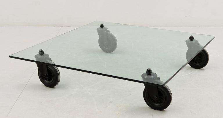 A Gae Aulenti 'Tavola con Ruote' table, Fontana Arte, Italy.