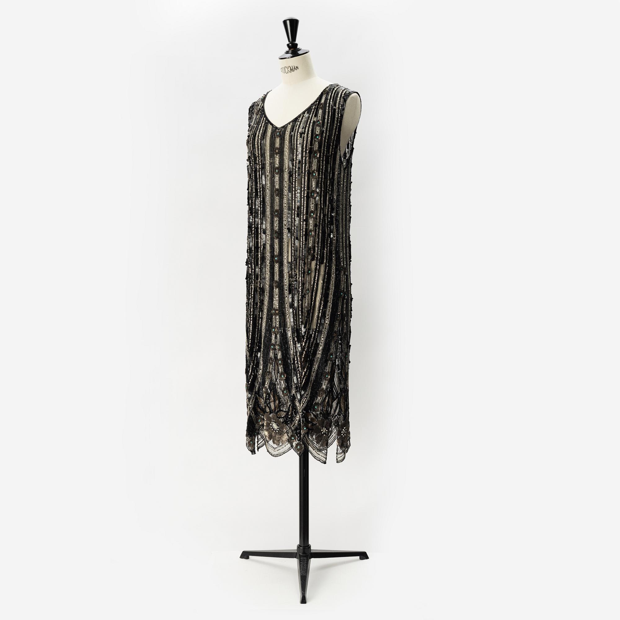 A sequin and pearl-embroidered 1920's dress.