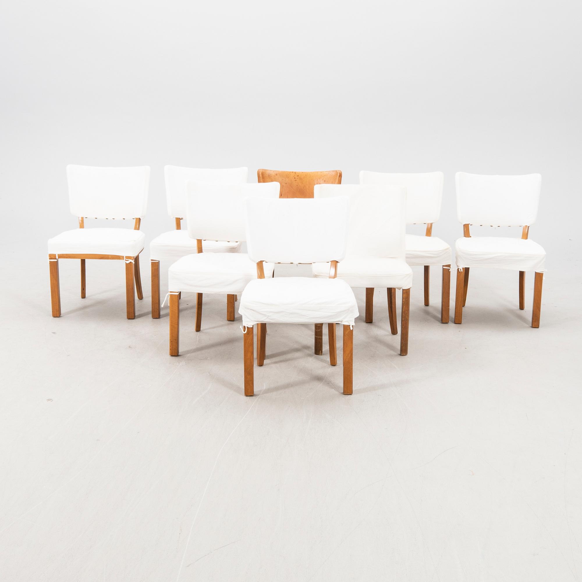 A set of seven + one leather chairs from Mobilia Malmö mid 1900s.