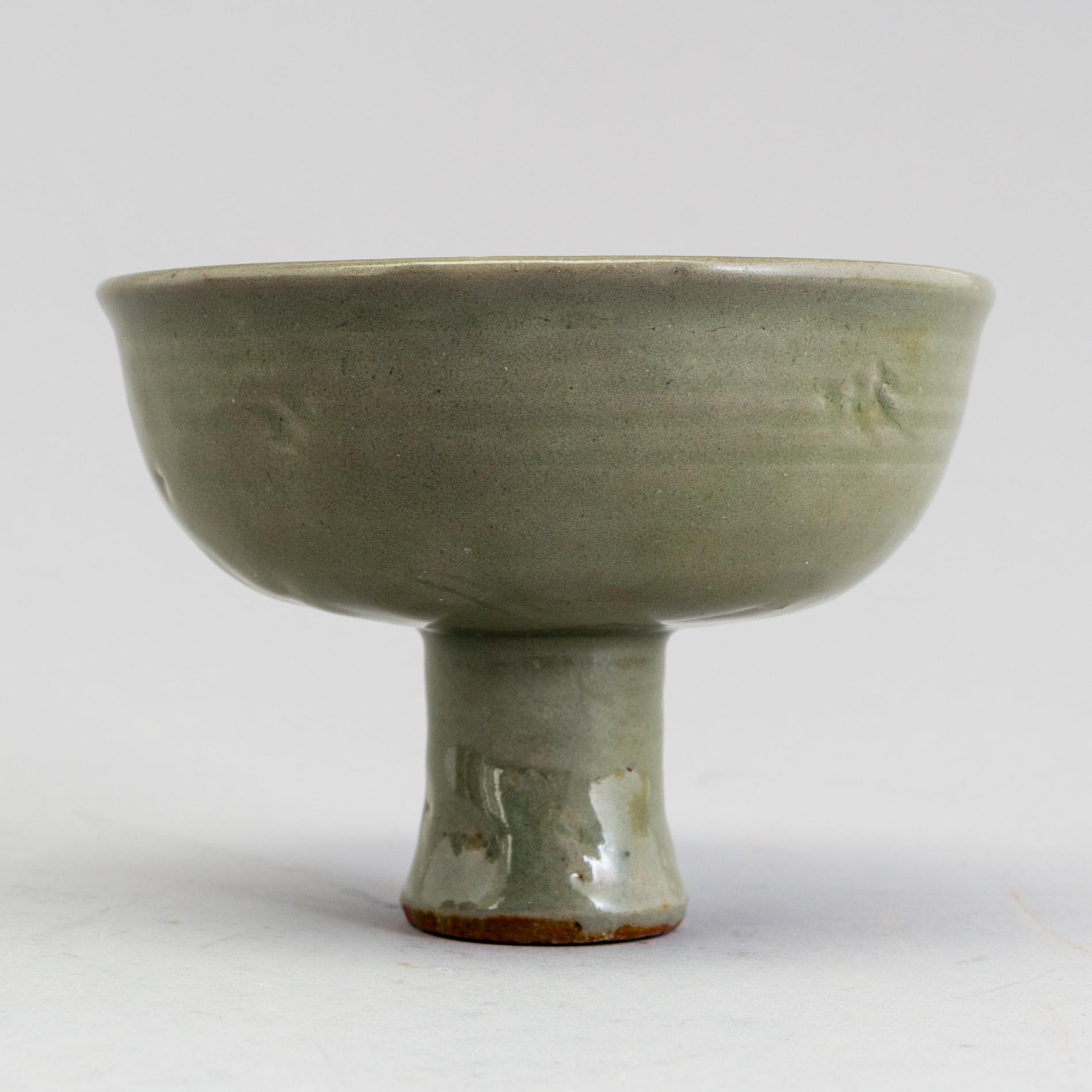 A celadon glazed stem cup, Ming dynasty (1368-1644).