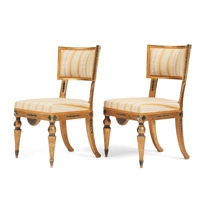 A pair of Late gustavian chairs in the manner of C G Gjörwell (1766-1837).