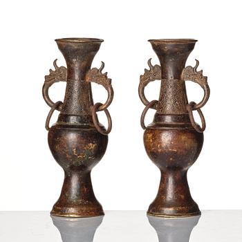 A pair of bronze altar vases, Ming dynasty (1368-1644).