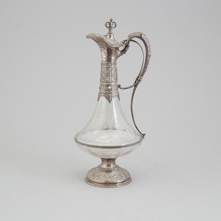 A glass and silver caraffe by Gustaf Möllenborg, Stockholm 1881.