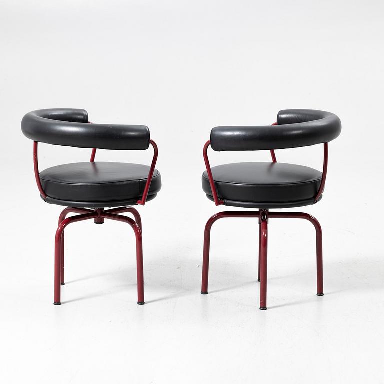 Charlotte Perriand, /Le Corbusier, swivel armchairs, a pair, model LC7, Cassina, Italy, latter half of the 20th century.