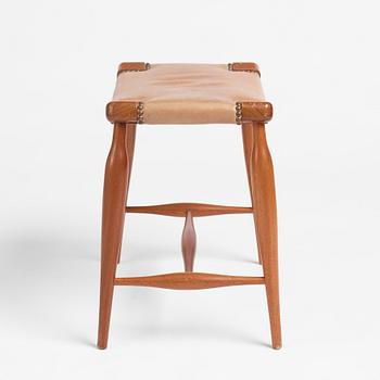 Josef Frank, a mahogany and leather upholstered stool, model 967, Svenskt Tenn.