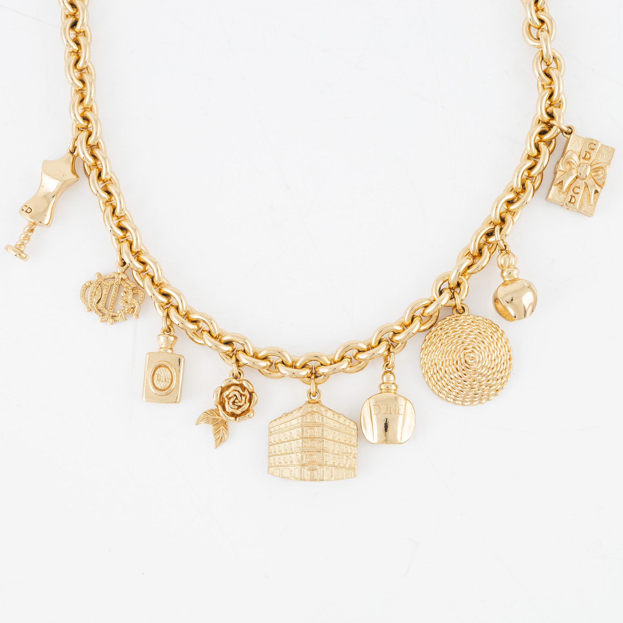 Christian Dior, necklace and pin.