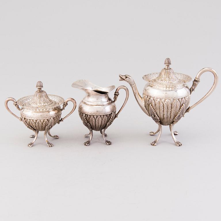 A three piece late 19th century Central European silver (800) coffee set.