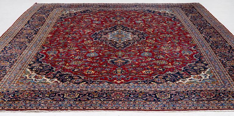 A Keshan carpet, c. 384 x 300 cm.