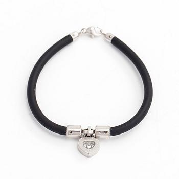 Chopard, armband, "Happy Diamonds", 18K vitguld, gummi och en diamant 0.05 ct.