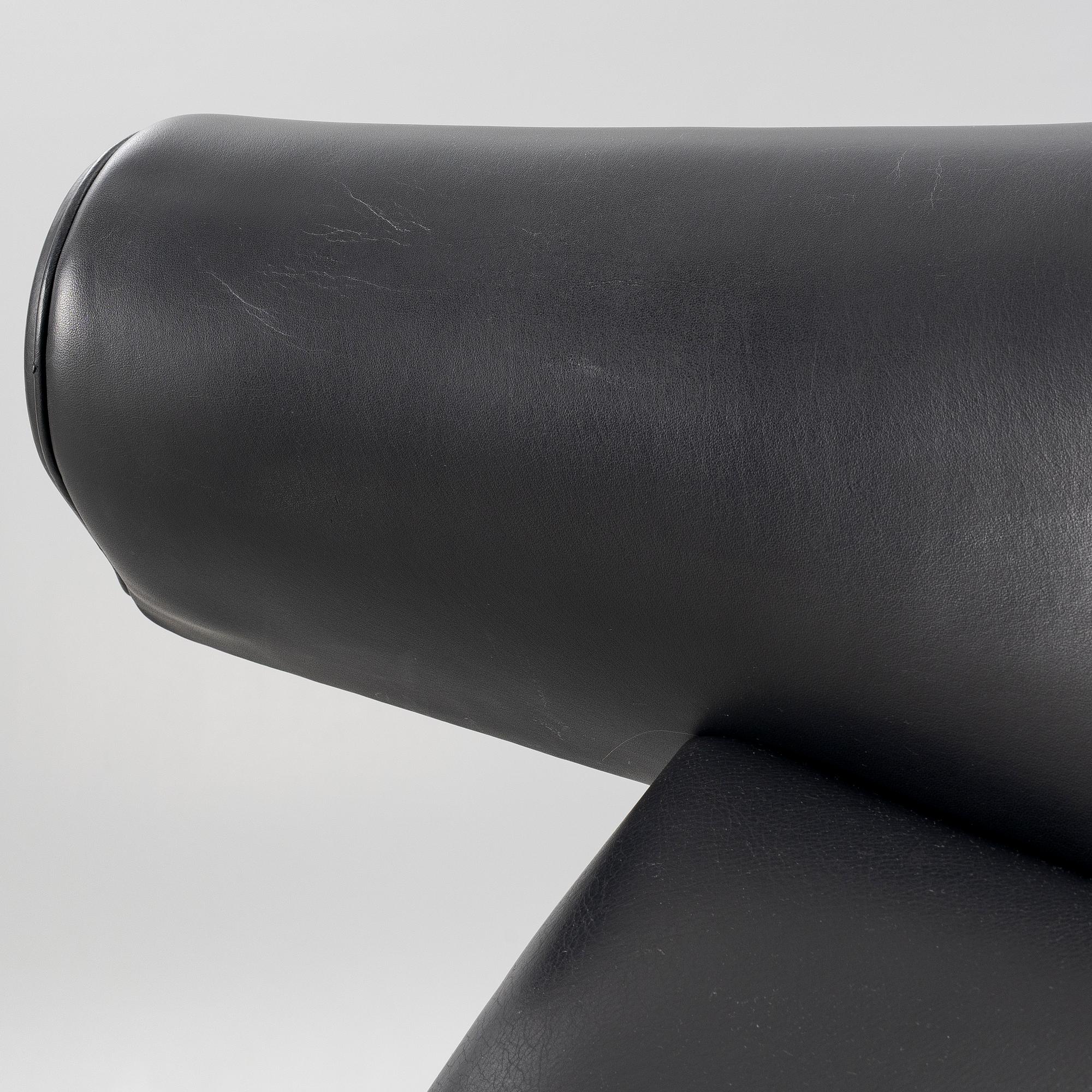 Hans J. Wegner, fåtölj med fotpall, "Ox Chair", EJ-100, Erik Jørgensen Møbelfabrik A/S, Svendborg, Danmark.