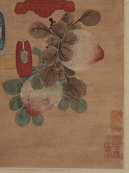 A hanging scroll with flowers and items from the scholars desk, late Qing dynasty (1644-1912).