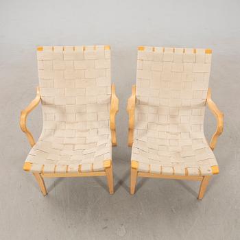 Bruno Mathsson, a pair of "Eva" armchairs for DUX, late 20th century.