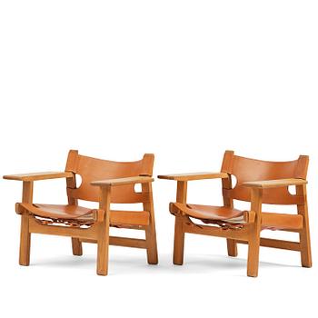477. Børge Mogensen, a pair of "Spanish Chairs", Fredricia Stolefabrik, Denmark.