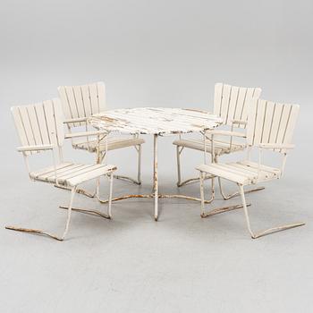 A garden table and four chairs, second half of the 20th Century.