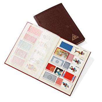 Two stamp albums with playing card collection och "Jokers".