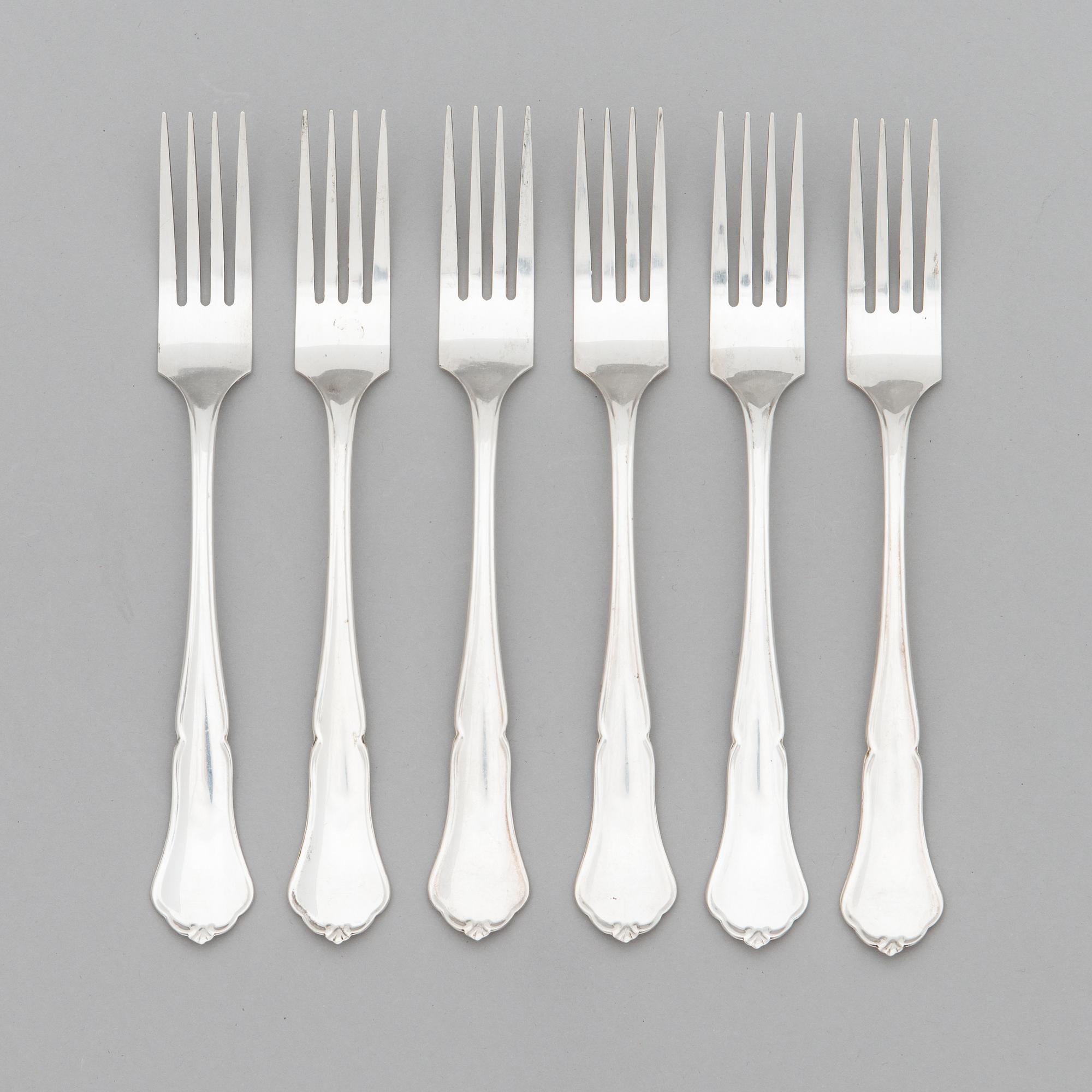 A 24-piece set of 'Chippendale' silver cutlery, Finnish hallmarks 1987-91.
