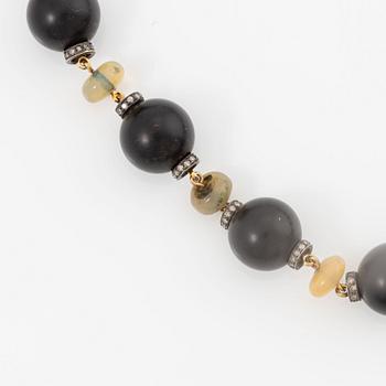 Necklace, 18K gold with onyx, opal, and diamonds.