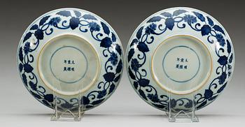 A pair of blue and white dishes, Qing dynasty (1644-1912) with Xuande six character mark.