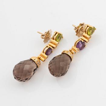 A pair of 18K gold earrings with briolette-cut smoky quartz, peridot, amethyst.