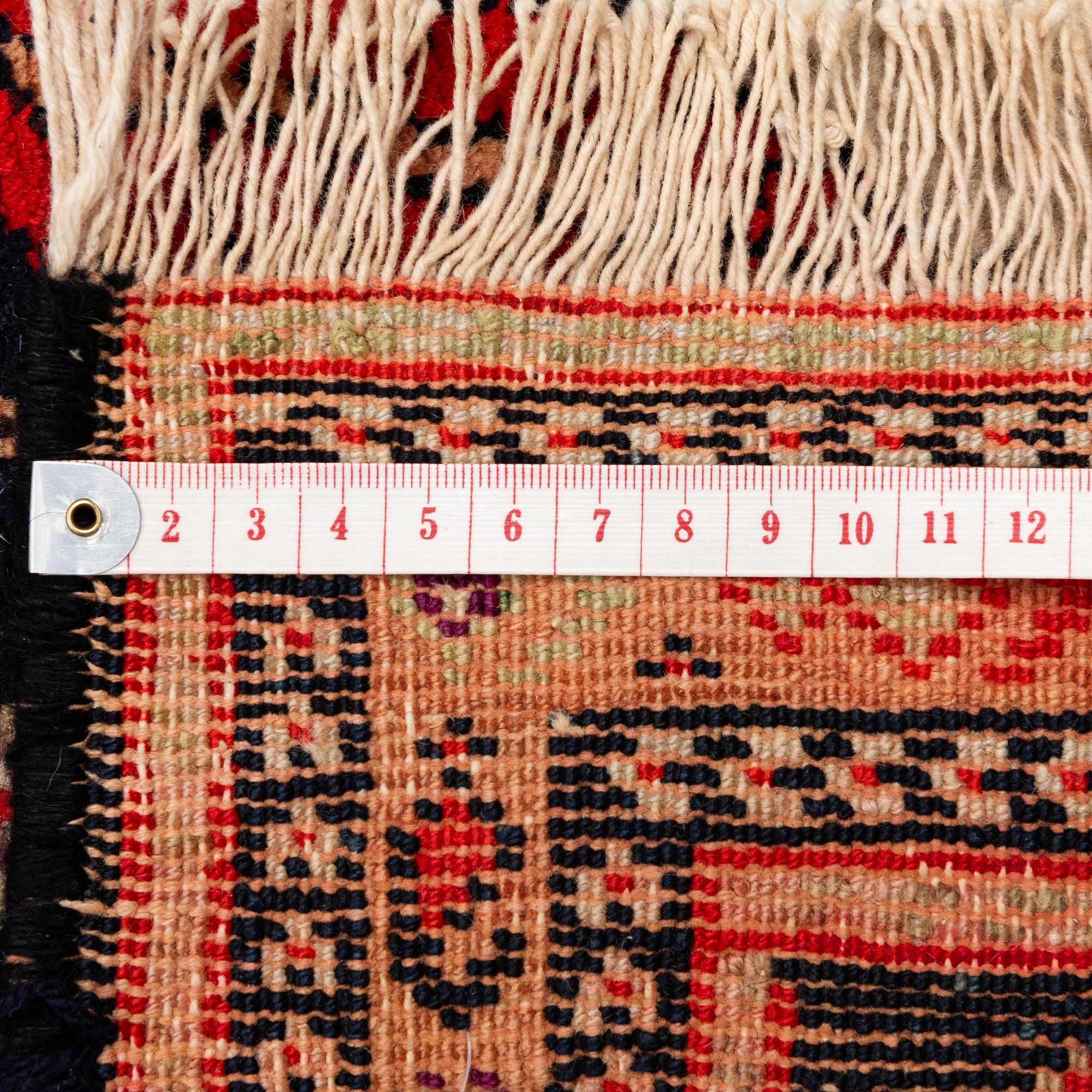 A semi-antique Northwest Persian (Iran) runner, c. 417 x 112 cm.