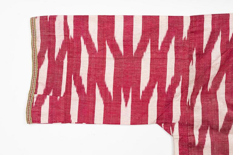 A silk and cotton Chapan, Ikat silk and cotton, Centralasien, 1880s.