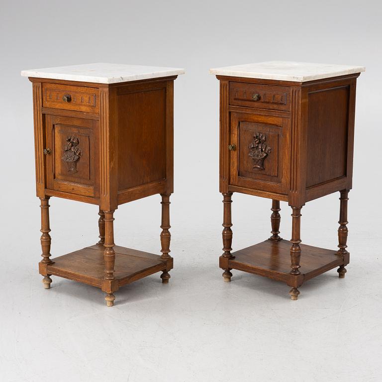 Á pair of bedside tables, circa 1900.