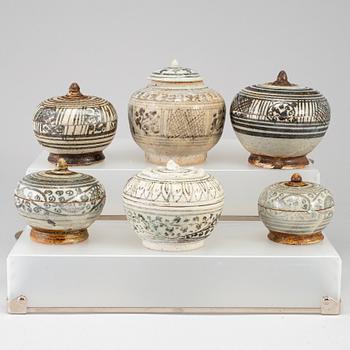 Six ceramic jars with covers, South East Asian, presumably 16/17th, also 19th century.