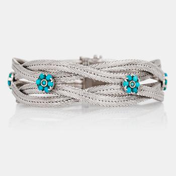 A turquoise and white gold bracelet.