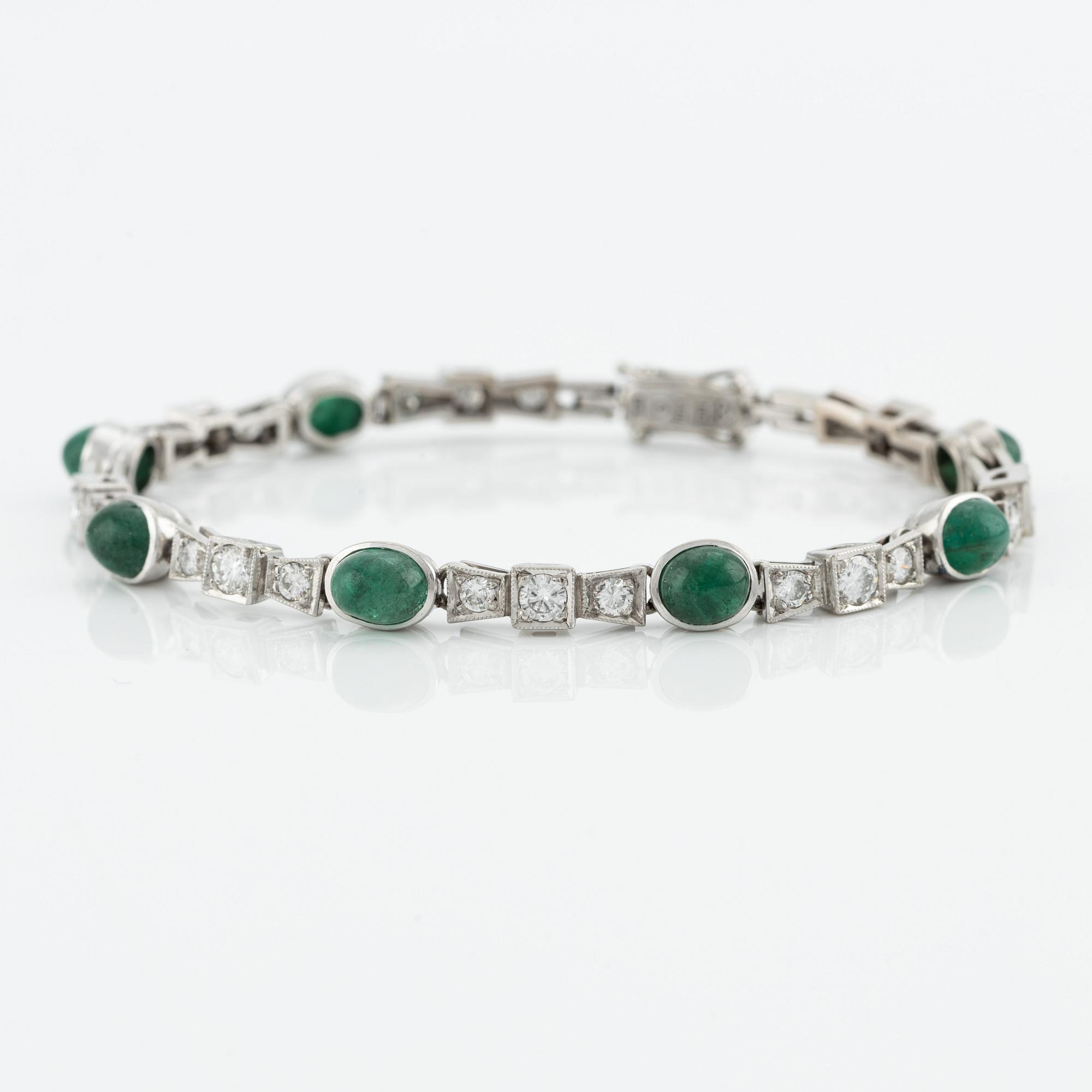 Bracelet, 18K white gold with cabochon-cut emeralds and brilliant-cut diamonds.