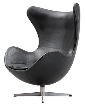 31. An Arne Jacobsen black leather and steel 'Egg Chair', Fritz Hansen, Denmark 1960's.