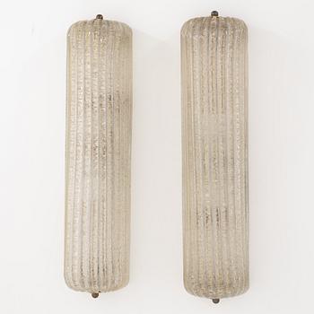 A pair of glass wall lamps, possibly Italy.