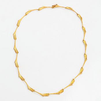 Björn Weckström, A 14K gold necklace "Shadow of a Convoy". Lapponia 1974.