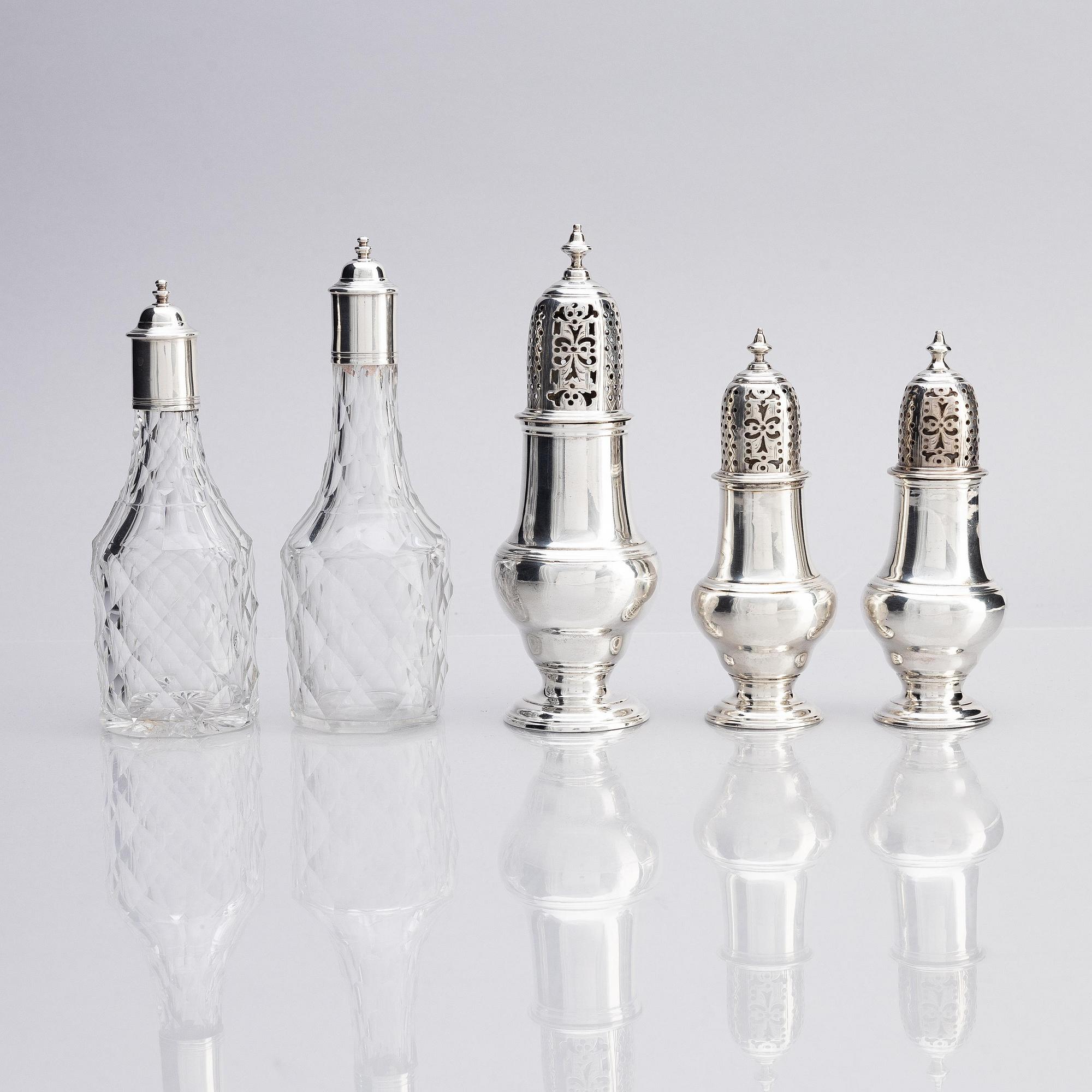 An English 18th century silver and glass cruet-set, mark of Jabez Daniel, London 1777 and possibly 1783.