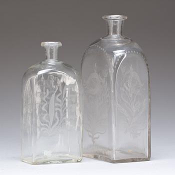BRÄNNVINSKARAFFER, glas, 2 st. 1800-tal.