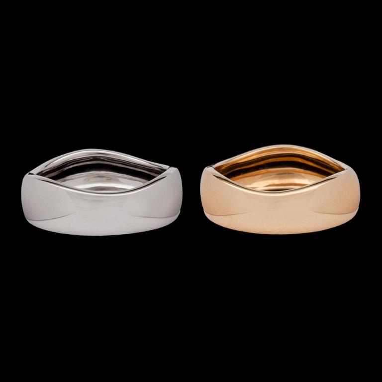 Two yellow- and white gold Cartier rings.