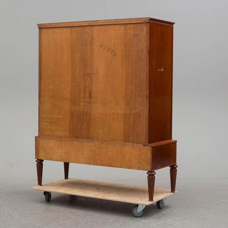 a mid 20th century mahogany cabinet.