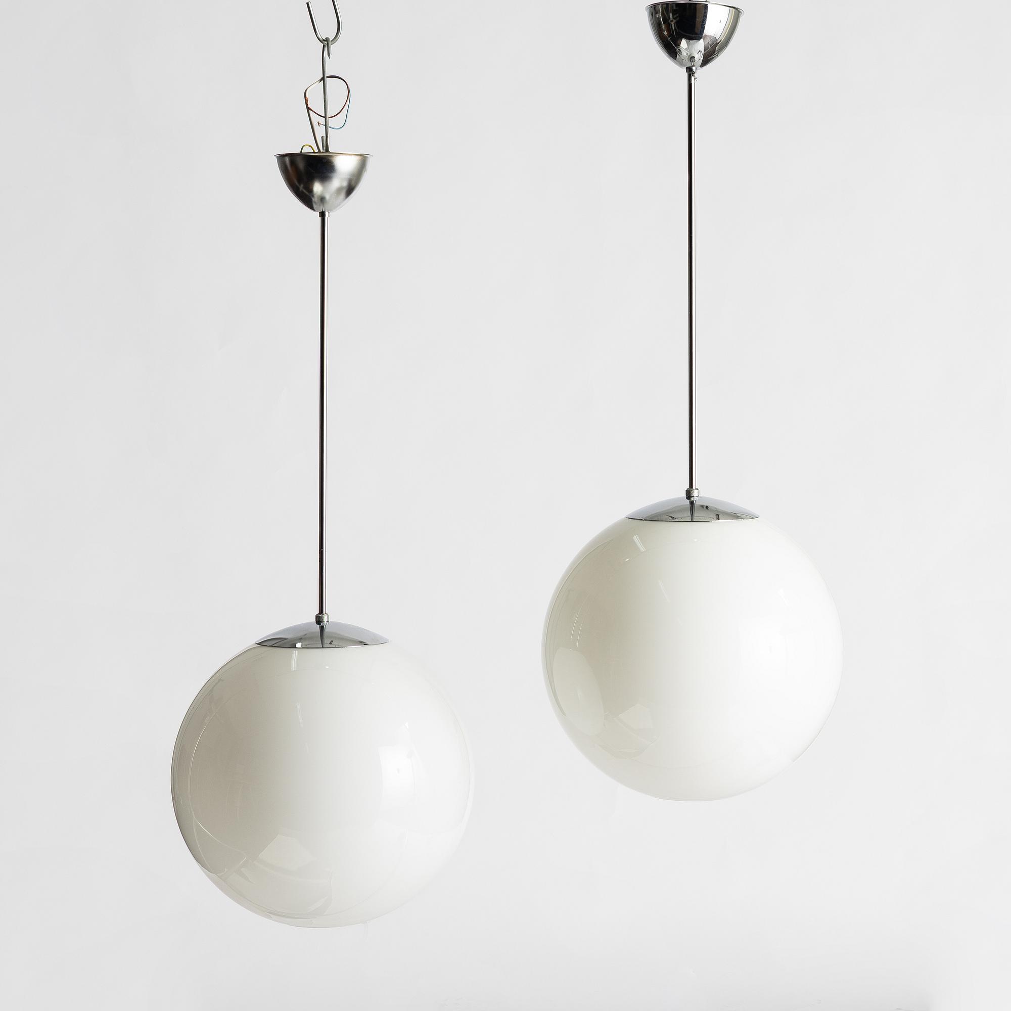 A pair of 'Funkisglob' ceiling lamps, Fox Design AB, Sweden, 21st century.