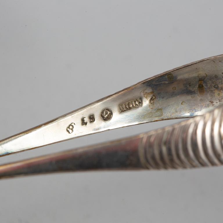 A silver sugar bowl and tongs, Gustaf Möllenborg, Stockholm 1831 and Michael Olof Barkman, Varberg 1824.